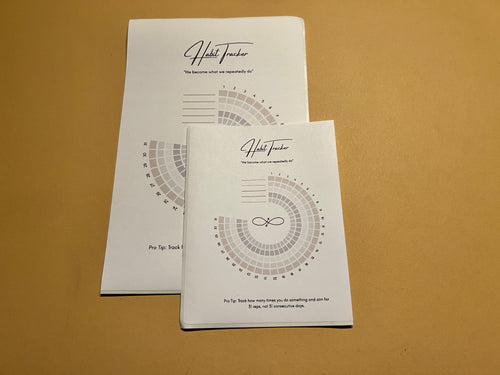 Habit tracker sticker on brown background